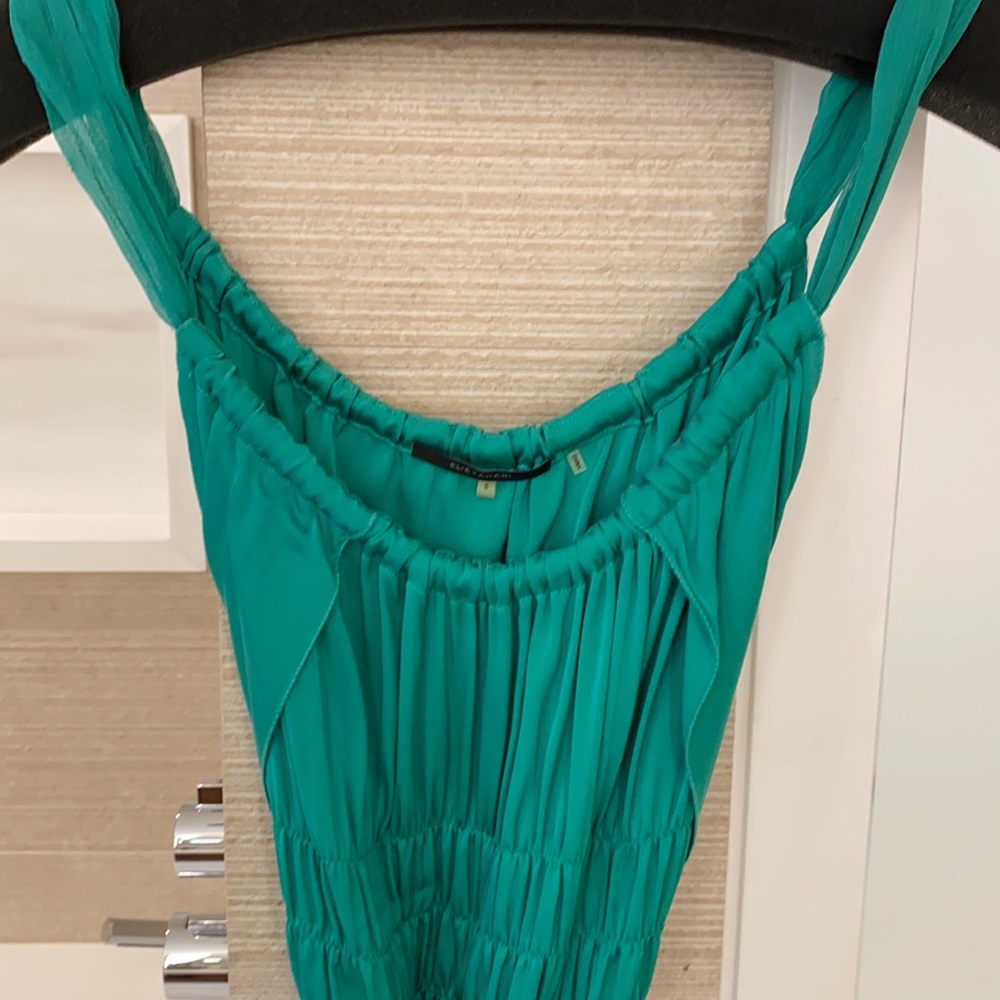 Green silk blouse